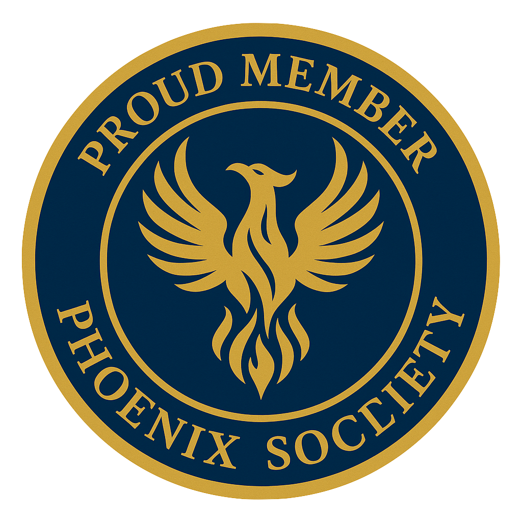 Circular emblem featuring a golden phoenix with wings spread above the text 'PROUD MEMBER' and 'PHOENIX SOCIETY'.